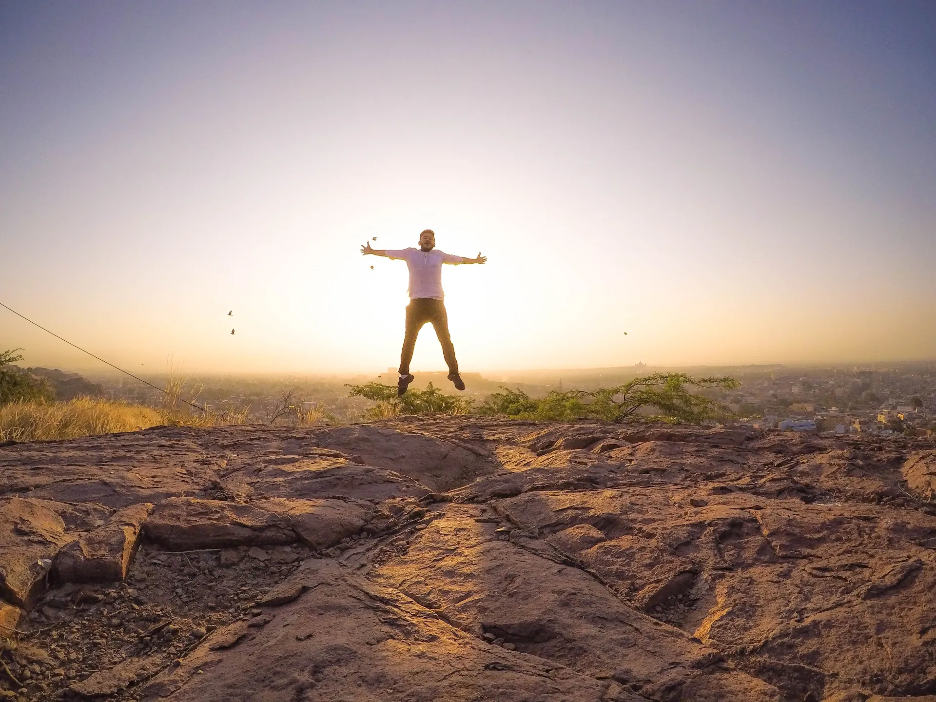 Man reaching his ultimate peak