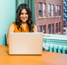 Woman Using Laptop