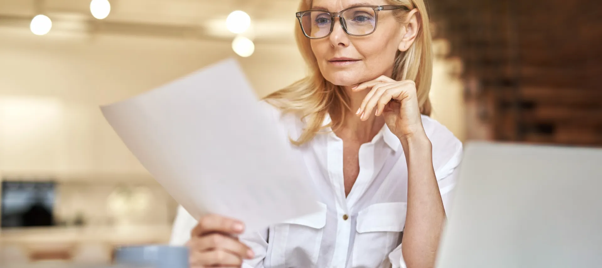 Man Wearing Eyeglasses Facing Computer