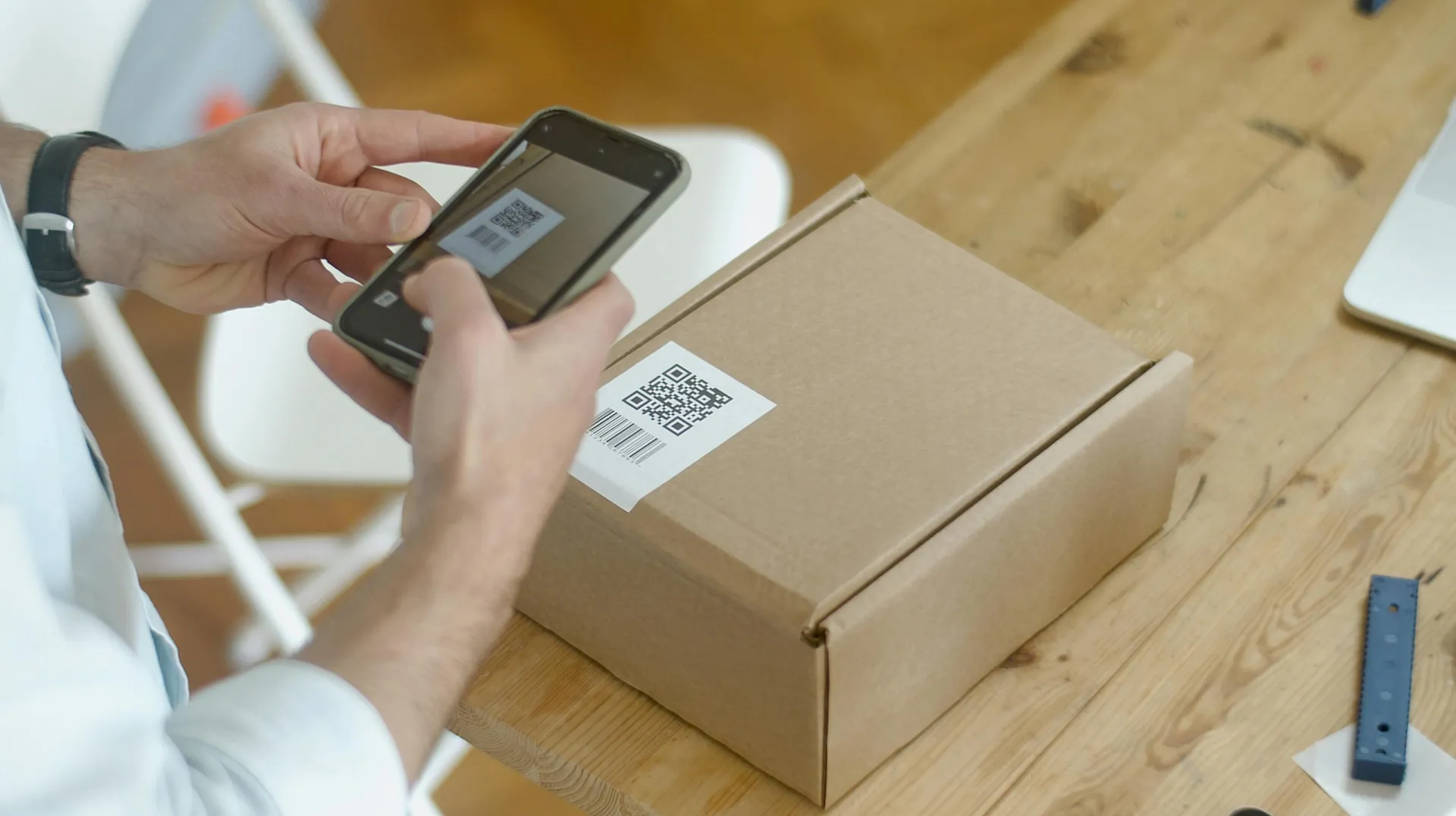 Person Taking Photo of the QR Code