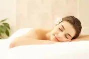 Woman Touching Her Right Leg
