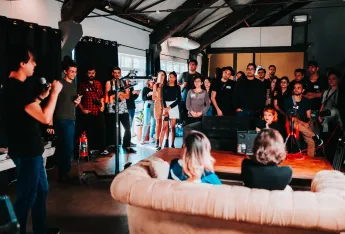 Group of People Standing Inside Room