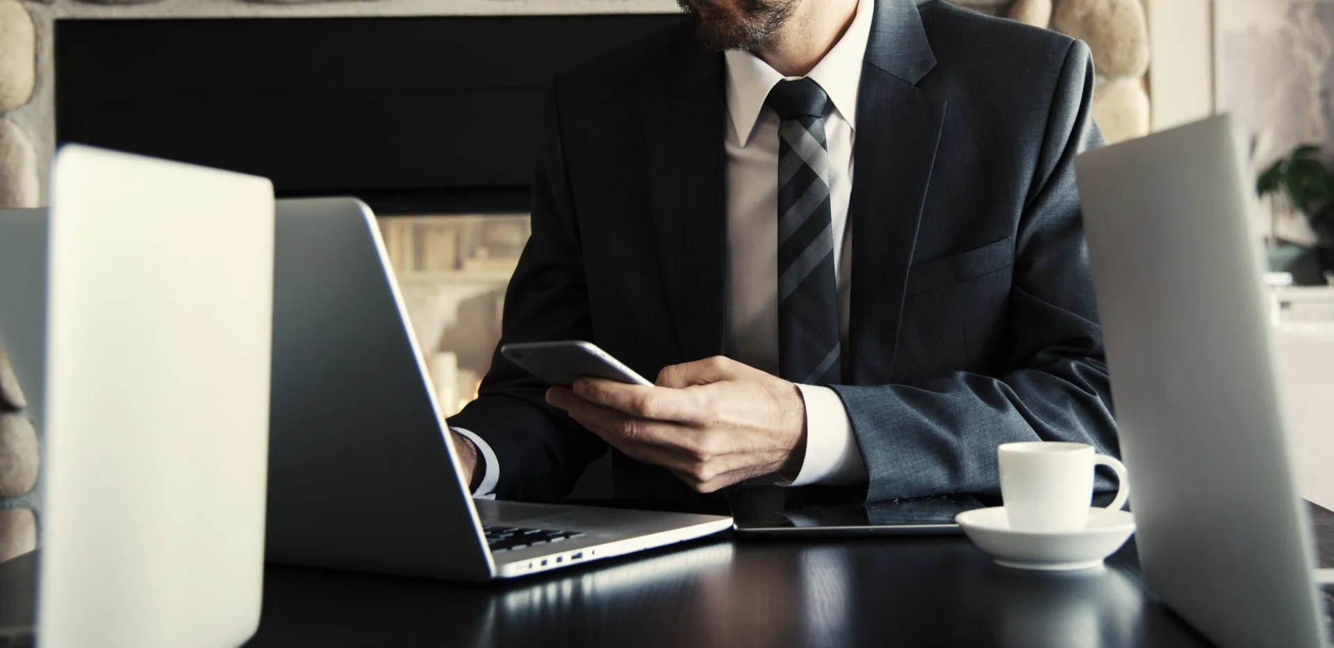 Man in Black Holding Phone
