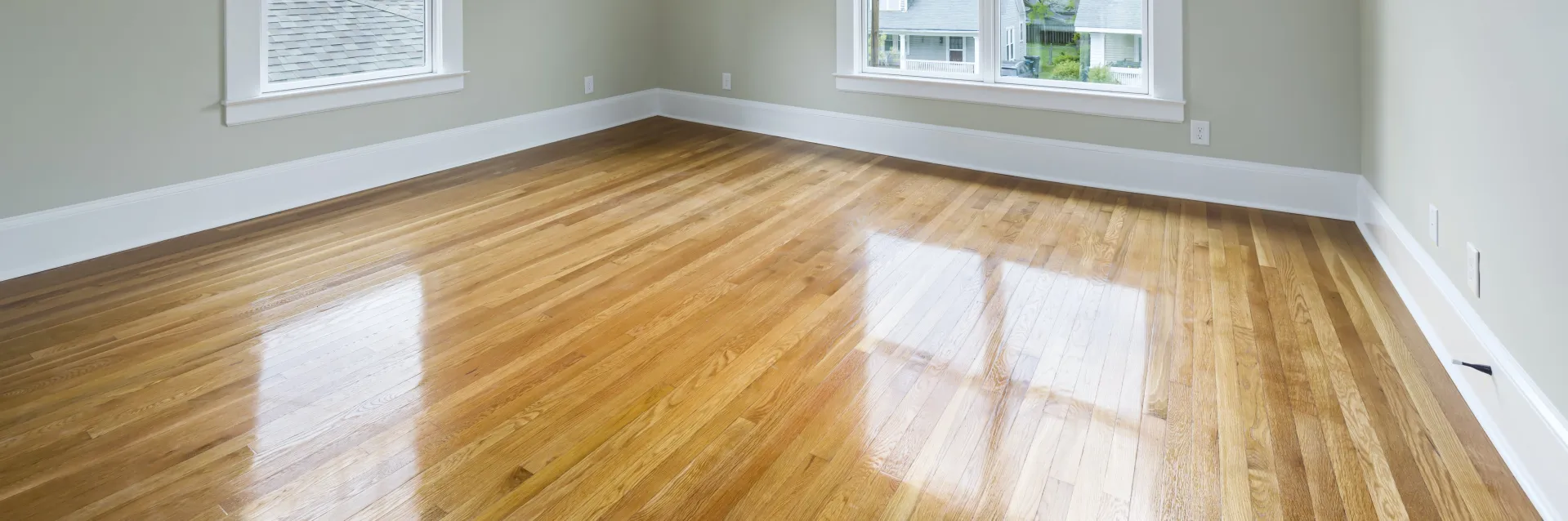 An Empty Living Room with Ceiling Fan