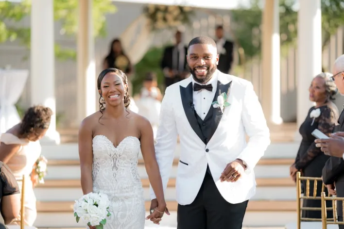 Happy Bride and Groom Walking Together