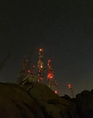 Low Angle Shot of Antennas during Night Time