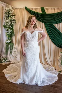 lace bridal gown with 3D flowers fit and flare off the shoulder