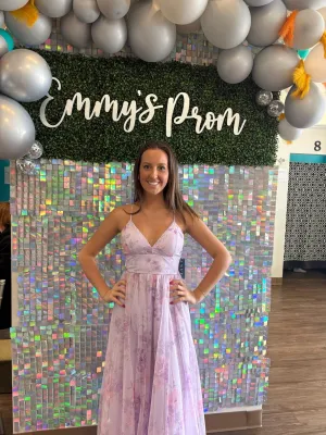 Envy Prom by Emmy's Prom fucshia pink sexy jersey prom dress. trendy u shaped slit shows plenty of leg and feathers at shoulder for 2023 trend