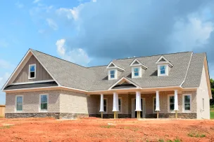 Gray Bungalow House Under Blue and White Cloudy Sky
