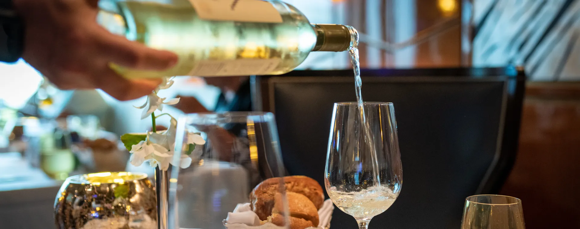 Wine Bottle Pouring on Wine Glass