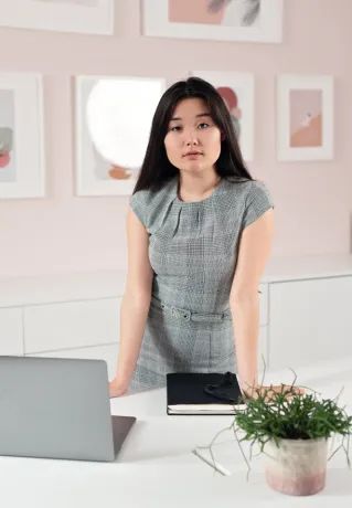 A Pretty Woman in a Grey Dress