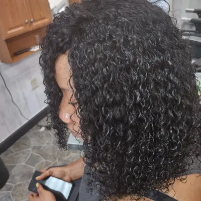 soft curly waves on shoulder length angled bob