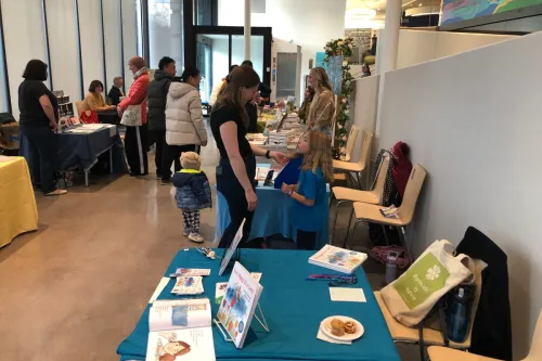 Gail's and other tables, authors and visitors at the Baldwin Bibliophile Bonanaza