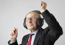 Man in Black Jacket Wearing Black Headphones