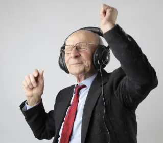 Man in Black Jacket Wearing Black Headphones