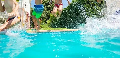 2 Girl's Swimming during Daytime