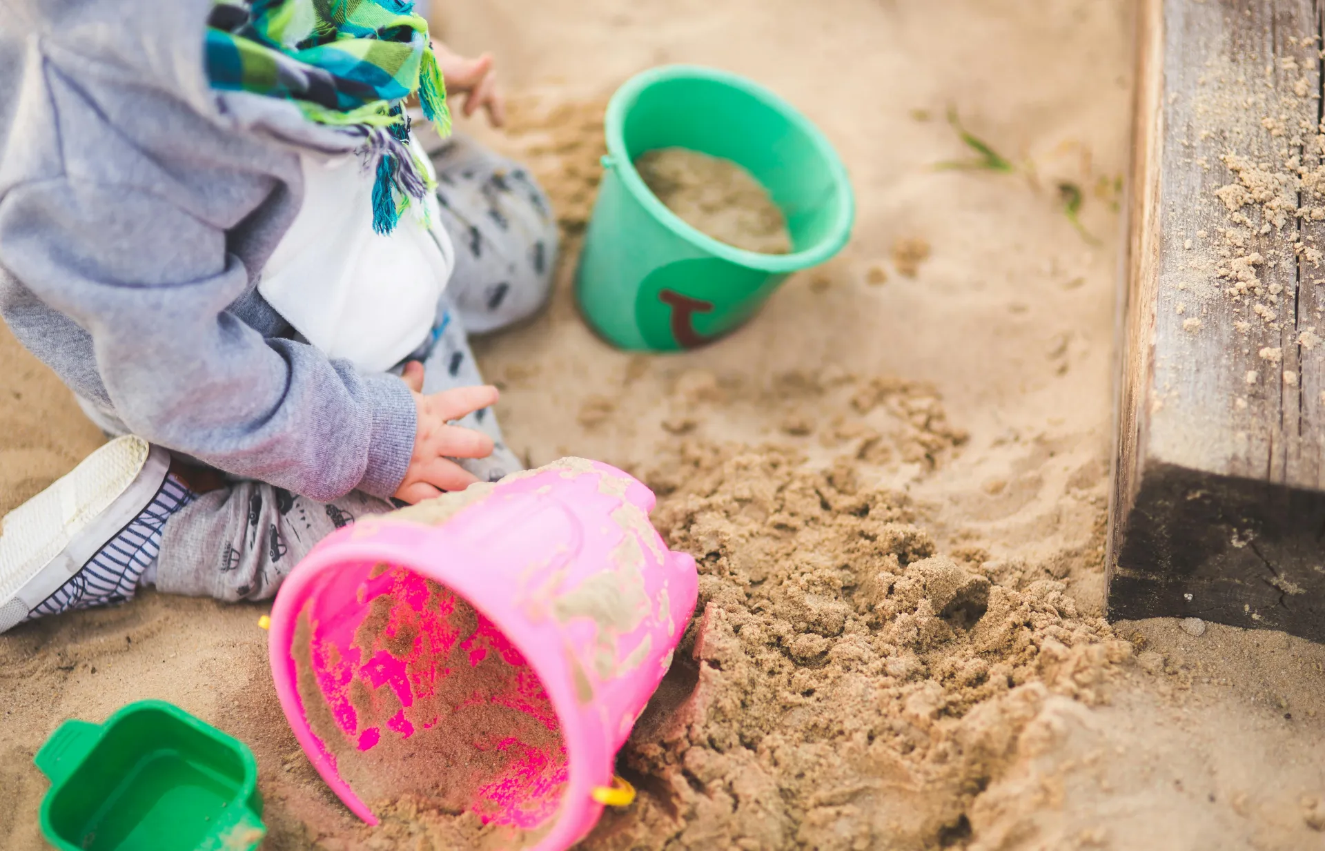 Little boy playing in the sand