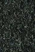 High-resolution image showcasing the texture of organic dried tea leaves, perfect for backgrounds.