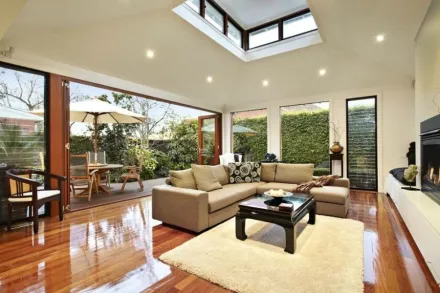 Adding a Michigan Folding Door glass wall system was like doubling our living space, what an improvement to our home!