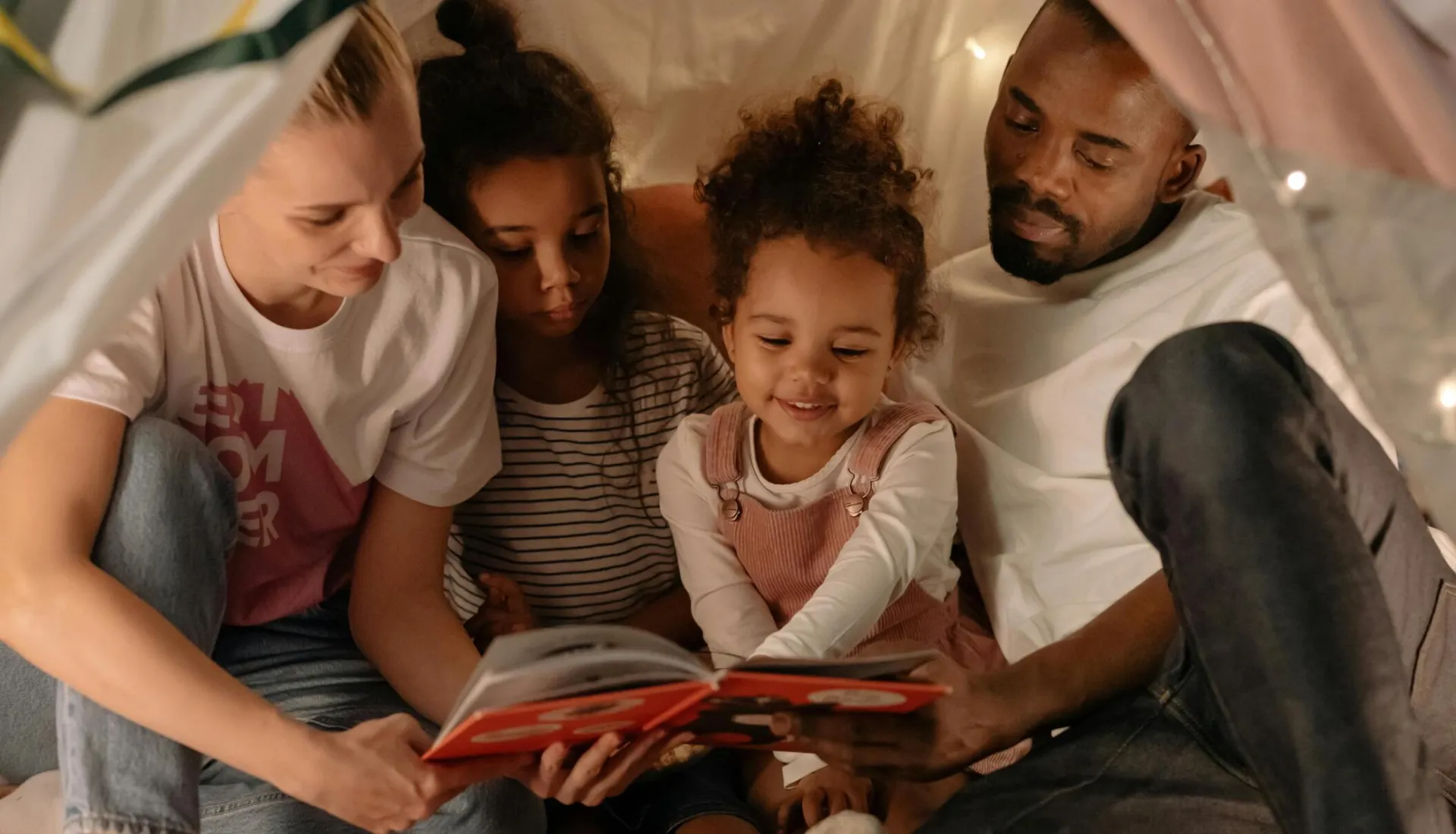 A Family Reading a Book Together