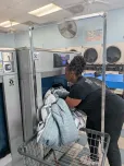 King-sized comforter loading into 80LB washer at the Washing Well in Spring Hill FL.