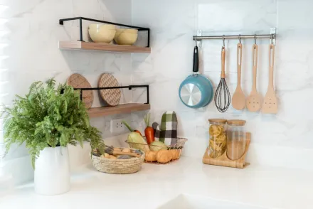 a countertop with kitchen utencils
