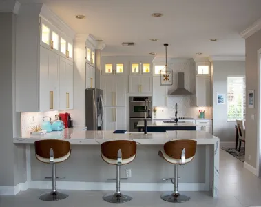 three stools in a kitchen that was remodeled by Design Stop