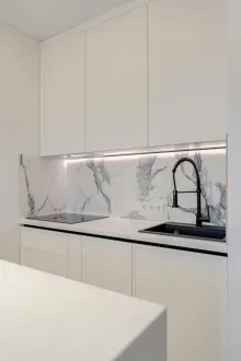 Kitchen With Sink and Stove Top