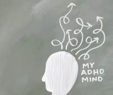 Creative depiction of the ADHD mind with chalk arrows on a green board.
