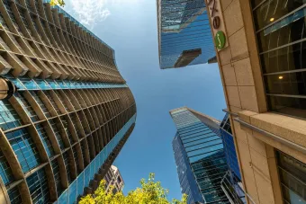 Dynamic view of modern skyscrapers reaching up to a blue sky in downtown Atlanta, Georgia.