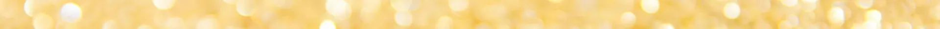 Abstract gold glitter background with a bokeh effect, ideal for festive designs.