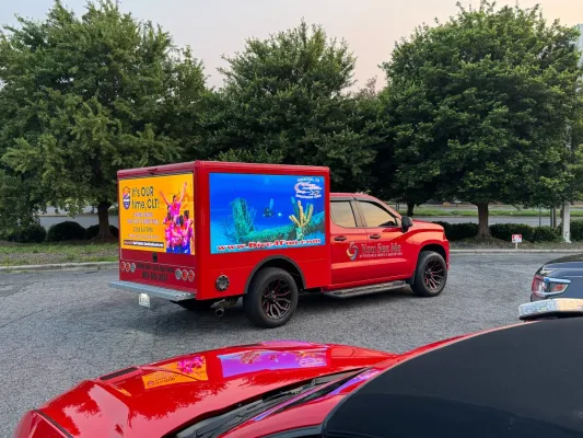 Powerful Toyota truck ready for an off-road adventure in a woodland setting.