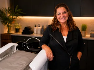 Relaxing spa treatment with facial and sponge massage in a serene environment.