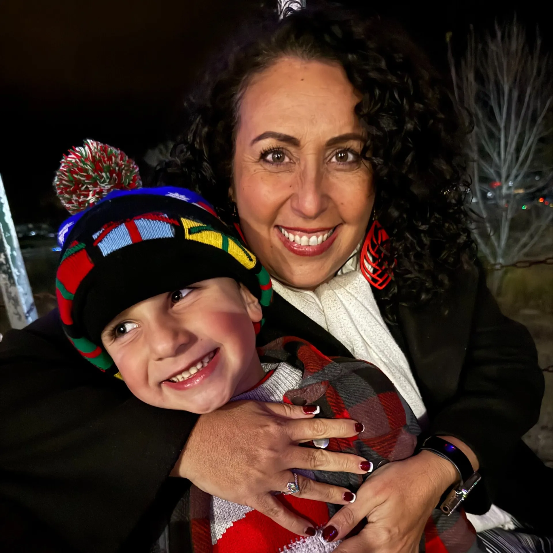 mother and son hugging and smiling