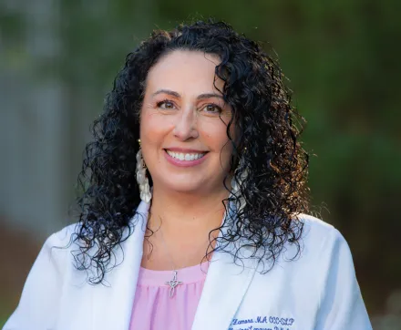 smiling speech-language pathologist