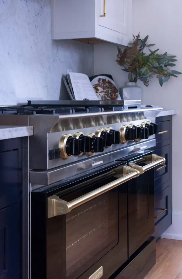 Two Tone Traditional/Transitional Kitchen With Navy And White Cabinetry And Brass Accents Kitchen Remodel by Acclaim Construction project photo 5