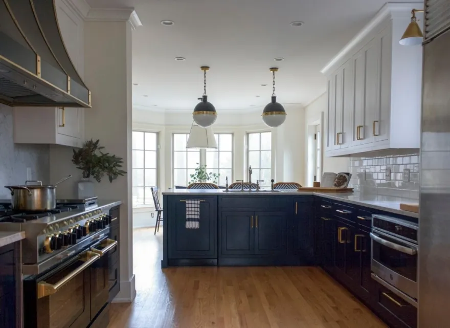 Two Tone Traditional/Transitional Kitchen With Navy And White Cabinetry And Brass Accents Kitchen Remodel by Acclaim Construction project photo 7
