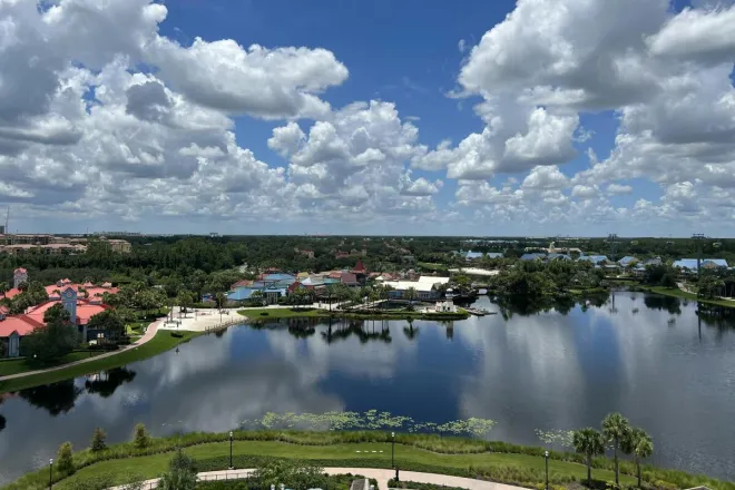 Aerial view of a scenic resort in Lake Buena Vista, Florida, with waterfront and lush landscape.