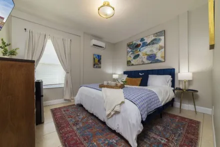 King bed in Azul room at Casa de Teo Boutique Inn in St. Augustine Historic District