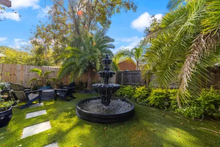 Peaceful courtyard with fountain at Casa de Teo Boutique Inn in St. Augustine Historic District