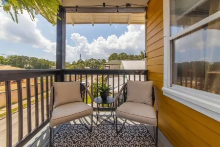 Private balcony with seating at Casa de Teo Boutique Inn in St. Augustine Historic District