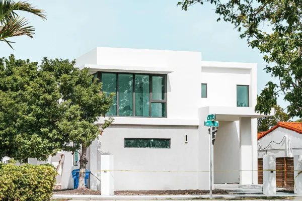 Explore this modern Miami residence with sleek lines and large glass windows.