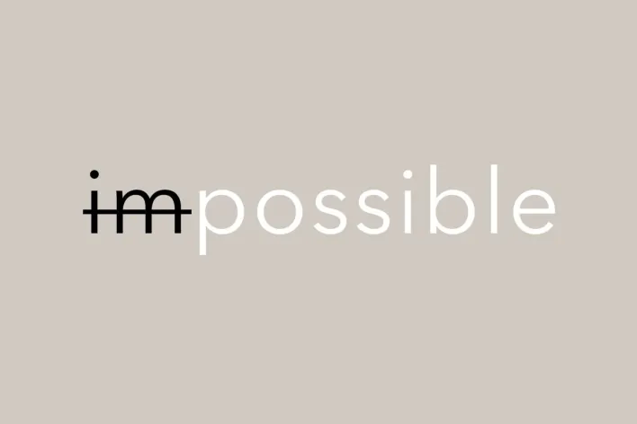 Minimalistic design with 'impossible' text for motivation.