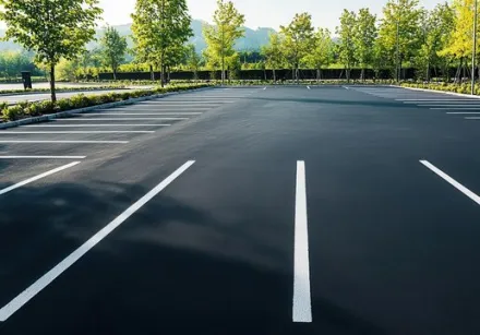 Empty underground parking lot with concrete pillars in Montreal, Canada.