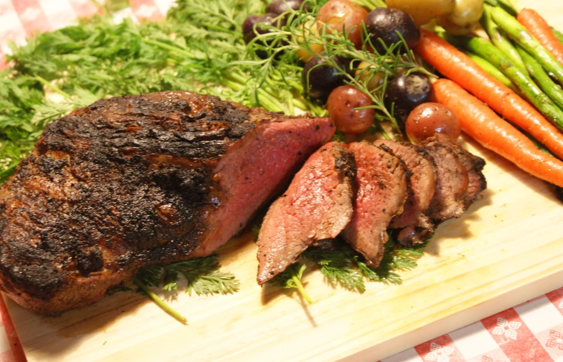 Elegant catering presentation with gourmet appetizers on a tray at a social event.