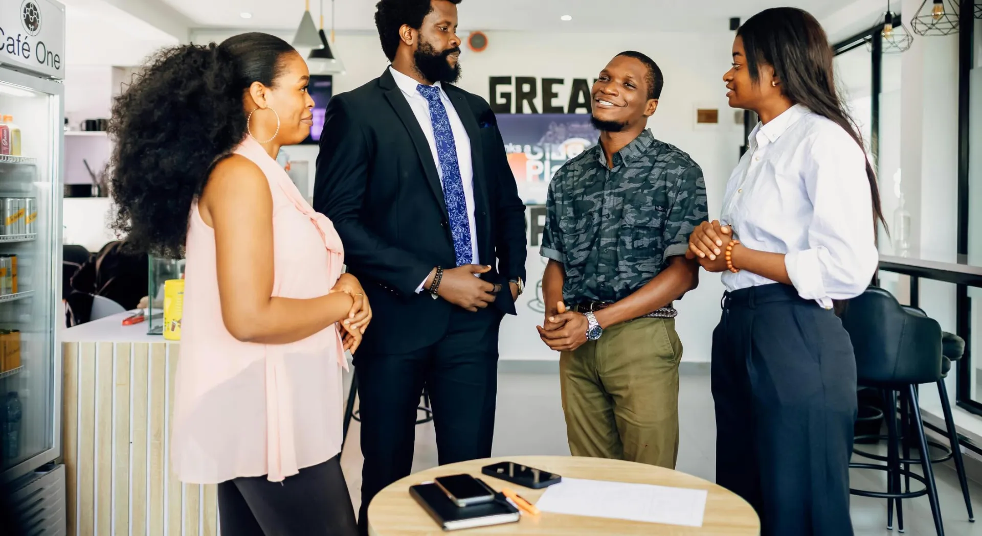 Group of professionals having a casual meeting in an office setting in Lagos.