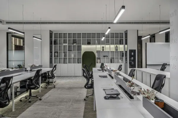 Explore this modern luxury office interior with open workspaces and sleek minimalist design.