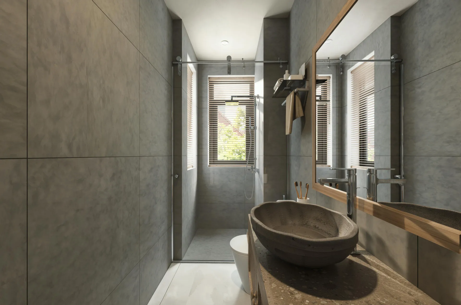 Stylish bathroom featuring stone sink, glass shower, and natural light for a contemporary feel.