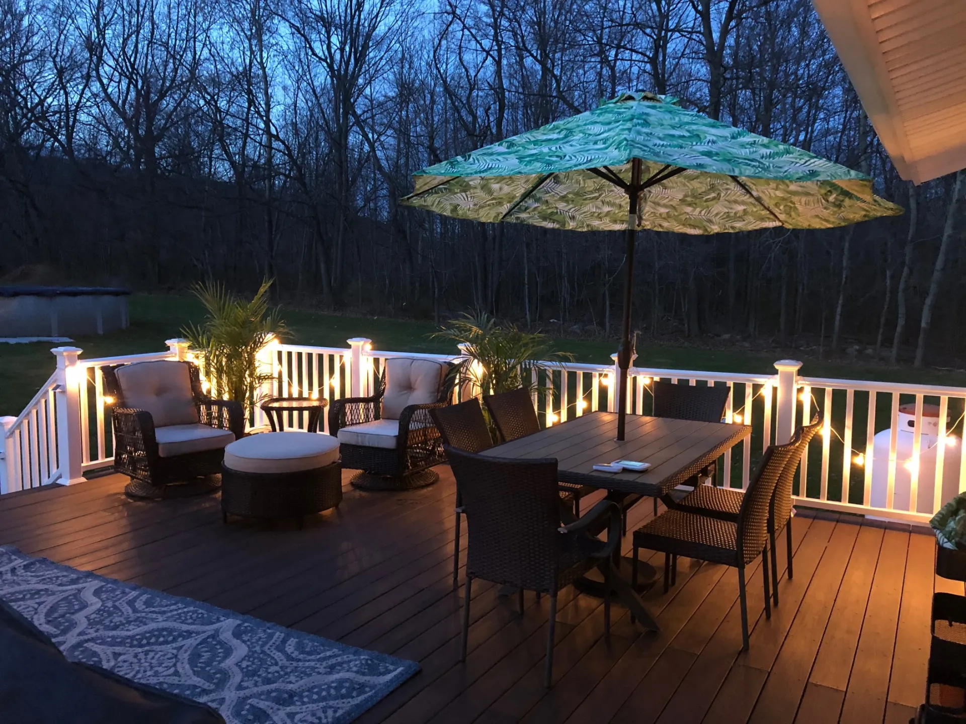 Elegant outdoor terrace in Jawa Timur, Indonesia, offering scenic forest views.