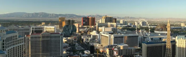 Stunning Las Vegas skyline at daybreak showcasing notable casinos and landmarks.